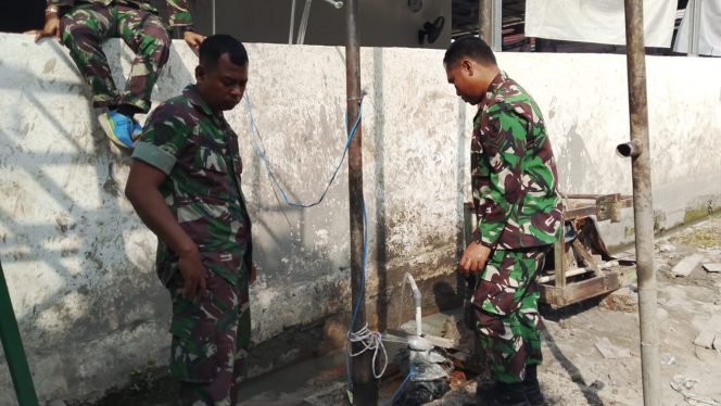 
 SATGAS TMMD KE-129 KODIM 0418/PALEMBANG RAMPUNGKAN TAHAP FINISHING SUMUR BOR RUMAH TAHFIZ DI TALANG JAMBI