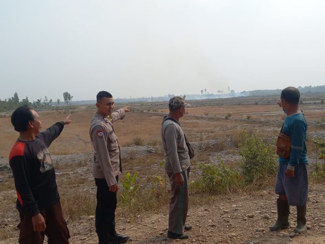 
 Polsek Lembak Verifikasi Hotspot BRIN di Lahan Cetak Sawah Desa Petanang
